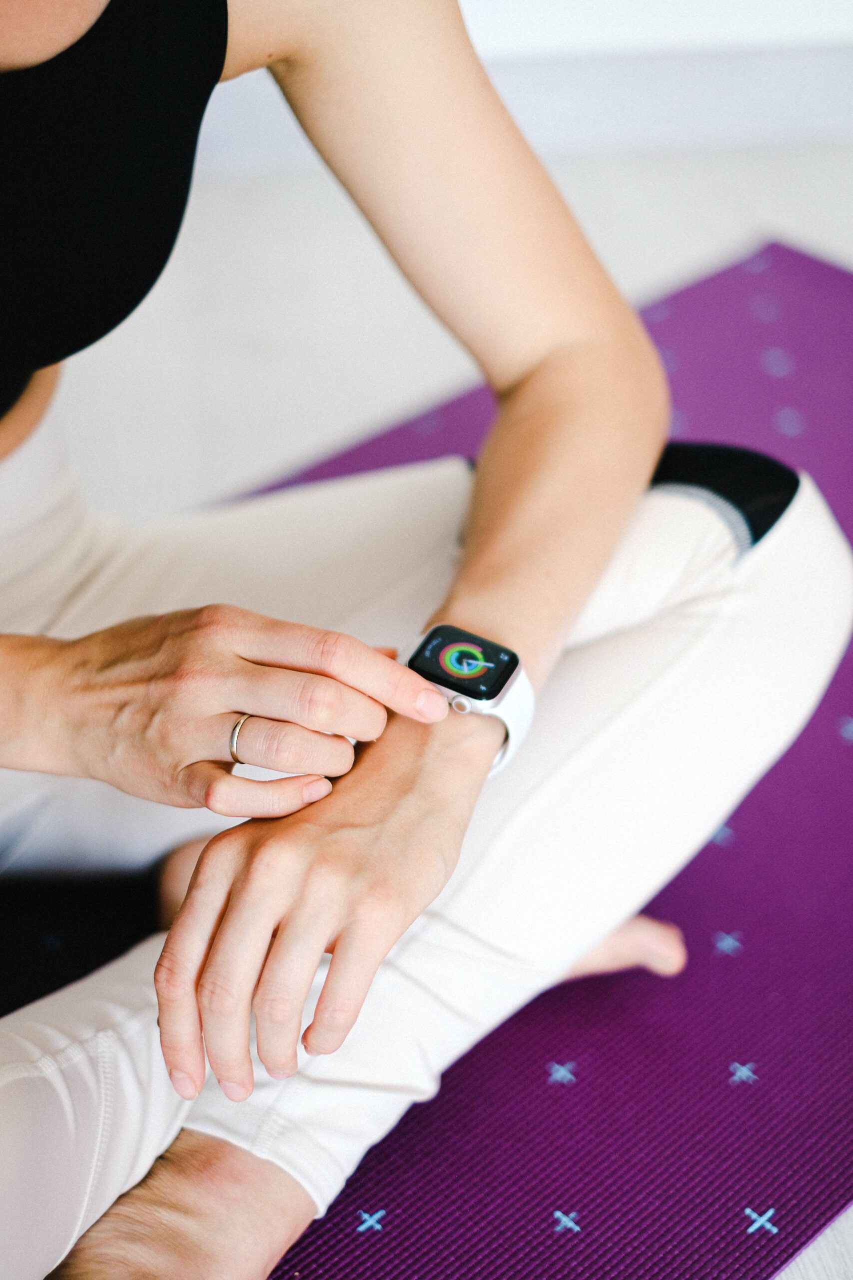 A person checking a smartwatch.